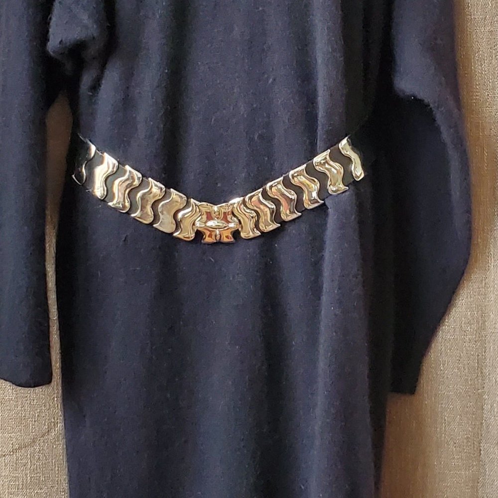 Belt: unique snakelike metal & black leather